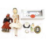 Two wooden peg dolls, a framed miniature etc.