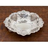 An oval silver pierced and embossed trinket dish, weighing approx 2.