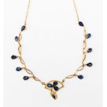 A Victorian 9ct gold and sapphire necklace, set with a total of 13 pear shape sapphires,