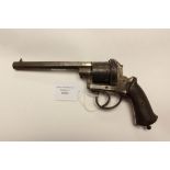 A pin fire Revolver. Spur to hammer and frame screw and clearing rod and gate are missing. 10mm cal.