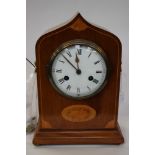 A late 19th century mahogany and satinwood inlaid bracket clock, ogee case, enamel Roman dial,