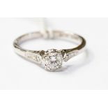 A diamond solitaire ring in 18ct white gold set with a round brilliant cut diamond approx .