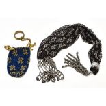 Two 19th century beadwork purses, one is incorporating French gilt metal stitch holders and ring,