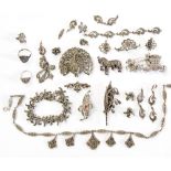 A collection of marcasite silver and white metal jewellery, including bracelets, clip on earrings,