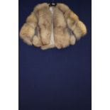 A fox bolero jacket JW Scott Furriers of Huddersfield,