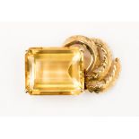 A large emerald cut citrine pendant, approx 19 mm by 15 mm,