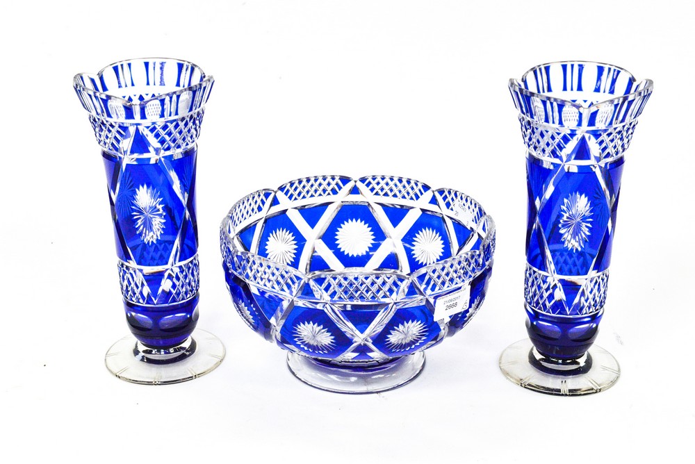 Two blue overlay cut glass vases and a matching footed bowl (3)