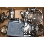 A three branch candelabra EPNS teapot and jug, boxed spoons and pastry forks, EPNS tray,