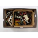 A box of Britain's farm animals and vehicles with assorted plastic farm animals,