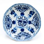 An 18th century Chinese blue and white bowl with inverted rim and the main body decorated with