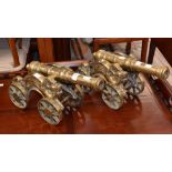 Two brass fireside cannons (2)