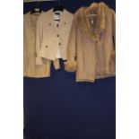 A ladies Burberry cream suede jacket with a Massimo Dutti cream jacket,