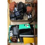 Two boxes of assorted cameras including Polaroid, Coronet, Adox, Kodak,