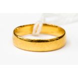 A 22ct gold wedding band, 4mm, size L , weight approx 2.