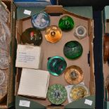 A box of various Caithness glass paperweights including 'Towards The Millennium' 'Ornamental Pool'