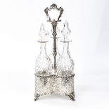 An EPNS Victorian decanter caddy, for three cut glass decanters (individual),