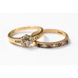 Two 9ct gold rings one set with a diamond flower head cluster,