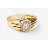 An 18ct gold solitaire diamond ring, the round brilliant cut diamond approx 0.