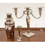 A silver plated cocktail shaker 1½ pint, a three branch candelabra and a silver flower vase,