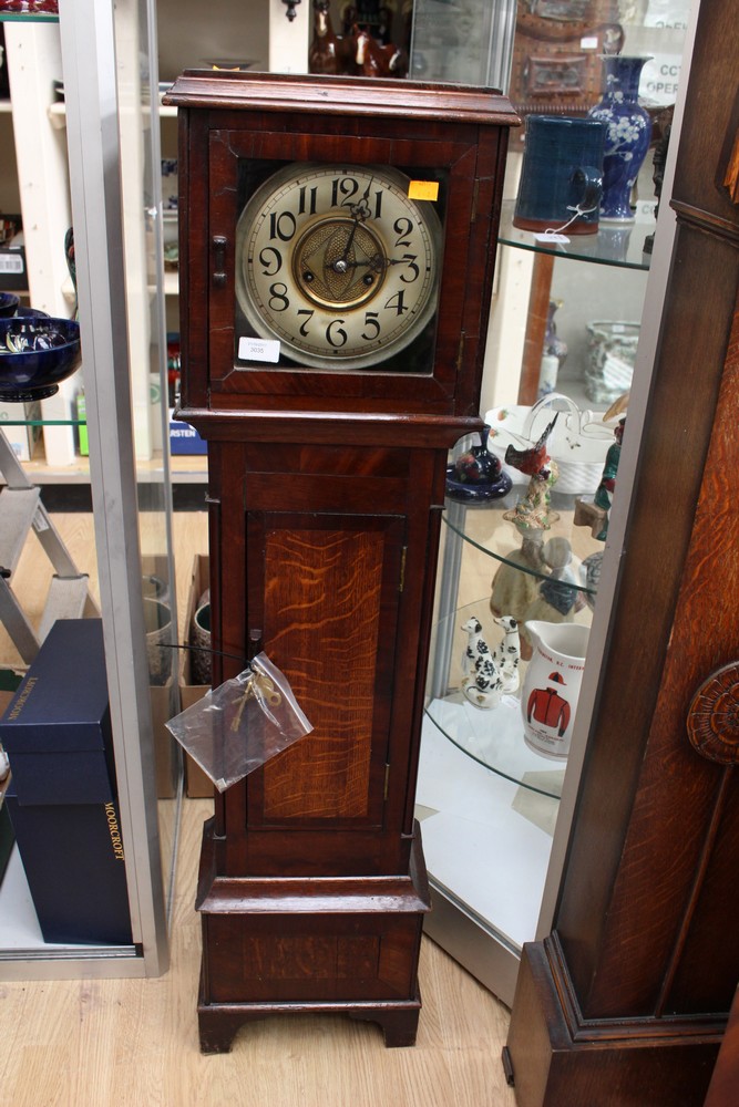 A 19th Century oak cased and mahogany cross-banded Grandmother clock,