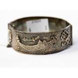A silver bangle with Turkish applied decoration