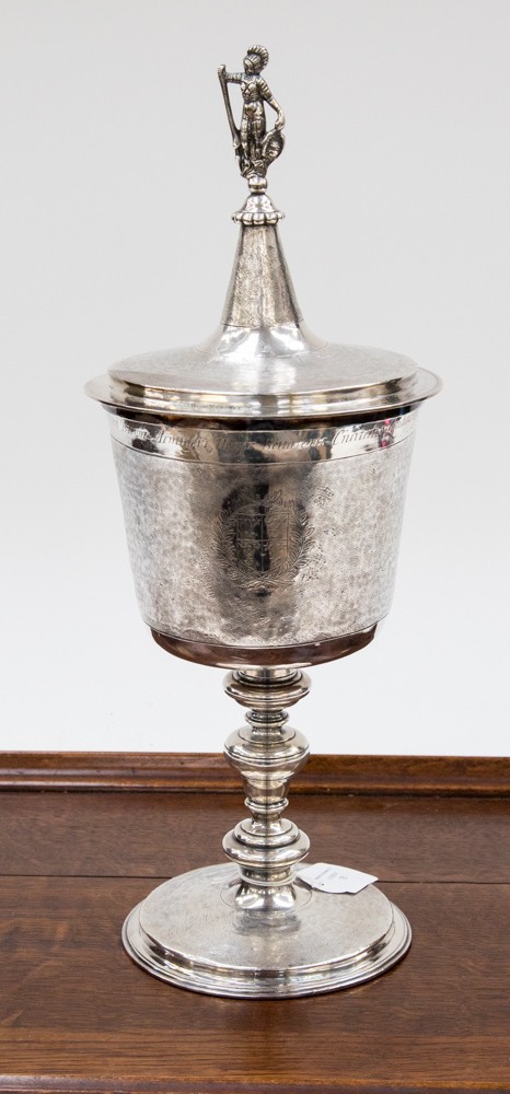 A 19th Century copy of a 17th Century silver standing lidded cup with heraldry design,