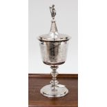 A 19th Century copy of a 17th Century silver standing lidded cup with heraldry design,