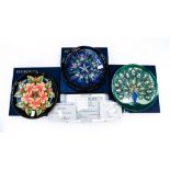 Three Moorcroft boxed and limited edition cabinet plates, Moocroft year plate, 10th edition 1991,