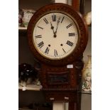 A 19th Century walnut veneered and parquetry inlaid eight day wall clock, probably American,