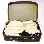 A suitcase of assorted vintage clothing to include Caroline Charles, historic style tapestry bodice,