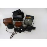 A collection of Kodak cameras to include Kodak Brownie No 20 Kodak Instamatic,