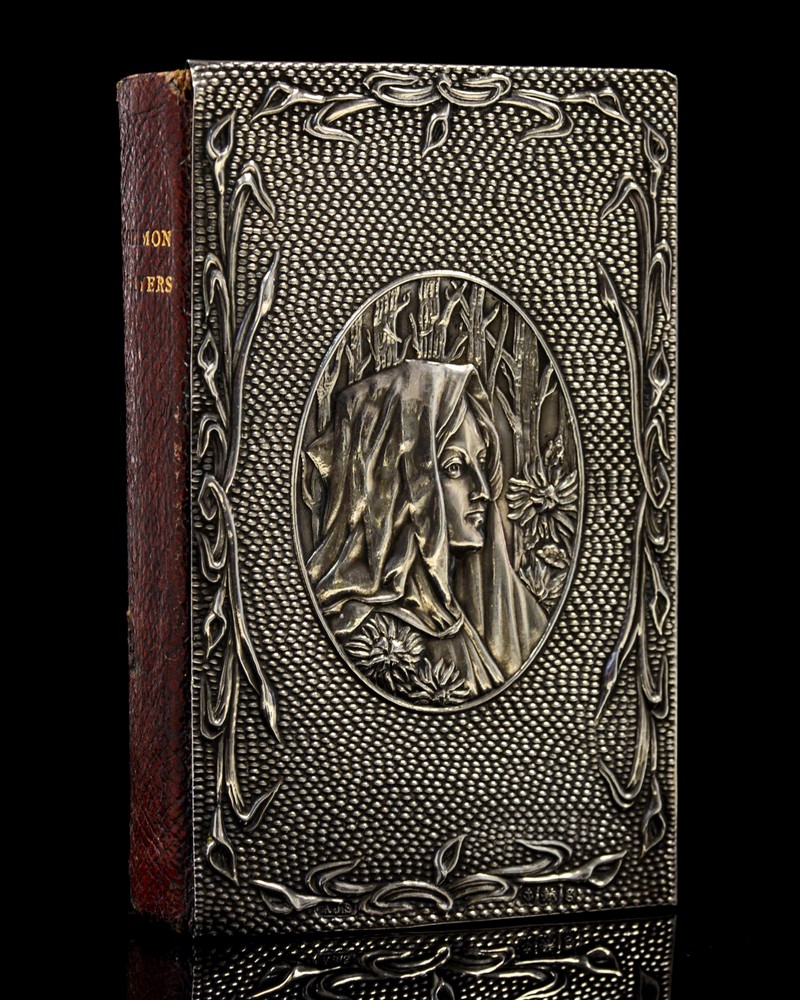 An Arts and Crafts silver covered Book of Common Prayer,