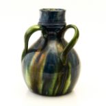 A Belgian Art Pottery tyg vase, green glazed bottle form with three handles,
