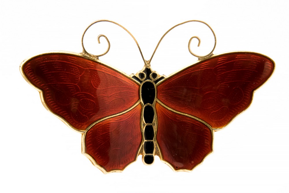 David Andersen, a Norwegian silver gilt and enamelled butterfly brooch, red basse taille enamel,