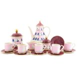 A Carlton Ware novelty tea set comprising of teapot, biscuit barrel, five cups, six saucers,