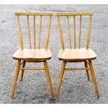 A pair of Ercol light elm and ash stick back kitchen chairs, 391,