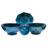 Four pieces of Istalif Afghanistan pottery, two bowls, a shallow bowl and a dish,