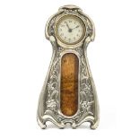 An Arts and Crafts silver timepiece photograph frame, in the Art Nouveau style,