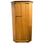 Rupert Griffiths, an Arts and Crafts, Cotswold School, carved oak wardrobe,
