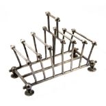 Christopher Dresser (attributed) for William Hutton and Sons, a silver plated toast rack,