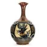 C H Brannam, an Art Pottery vase, 1888, globular form, Aesthetic Movement panels incised with birds,