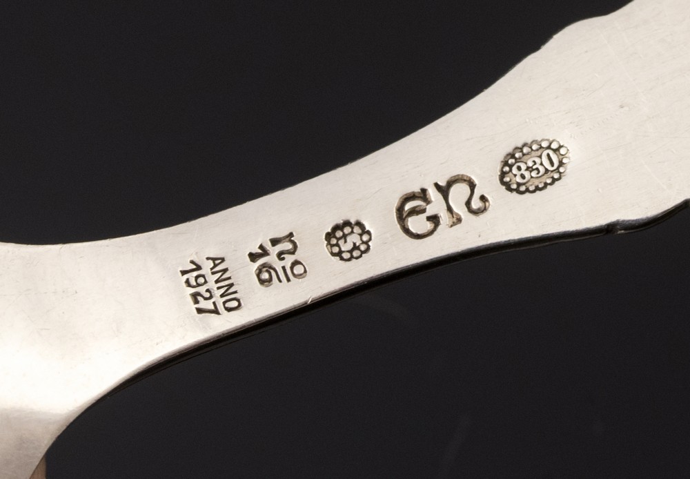 Evald Nielsen, a Danish silver cady spoon, 1927, hand hammered with stylised floral motif, 10. - Image 2 of 2