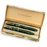 A Conway Stewart Dinkie 550 fountain pen and pencil set,