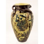 James Dewdney for C H Bramman Ware, an Art Pottery vase, 1895, three wavy handles to the neck,