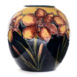 William Moorcroft, a Freesia vase, spherical form, yellow to blue ground,
