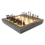 A Modernist cast metal chess set, circa 1960s, abstract zoomorphic figures, in the style of Picasso,