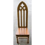 A Gothic Revival oak hall chair,