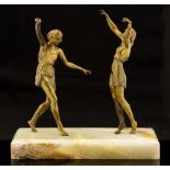 Attributed to Pierre Laurel, Two Dancers, a gilt bronze figure group, on onyx base,