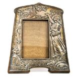 An Arts and Crafts silver embossed picture frame, in the Art Nouveau style,