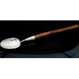 Peter B Harwood, a Modernist silver and wooden handled long spoon,